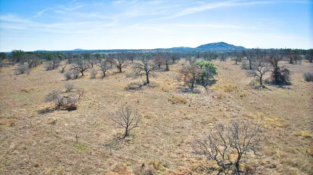 a view of mountain with covered by side of it