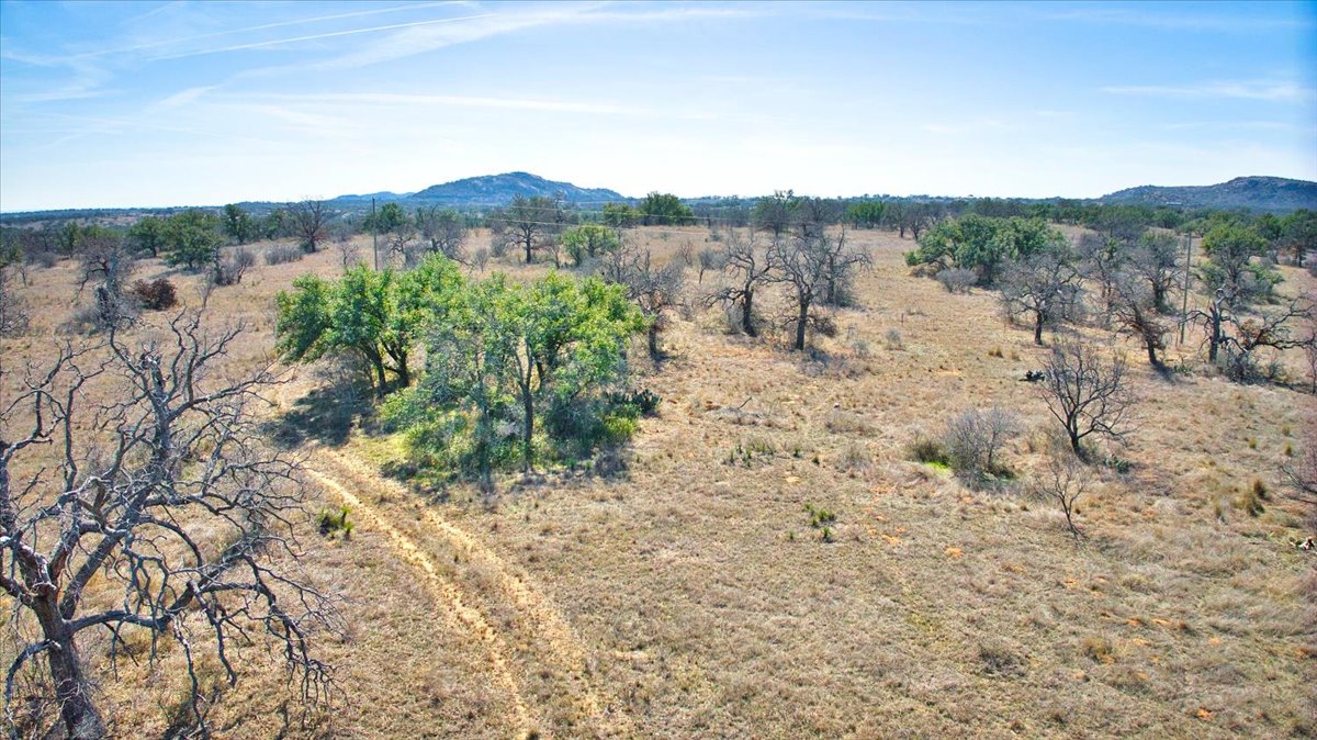 17431 Hickory Grove Road Pontotoc, TX 76869 - Photo 28 of 31 a view of a dry field with mountains in the background