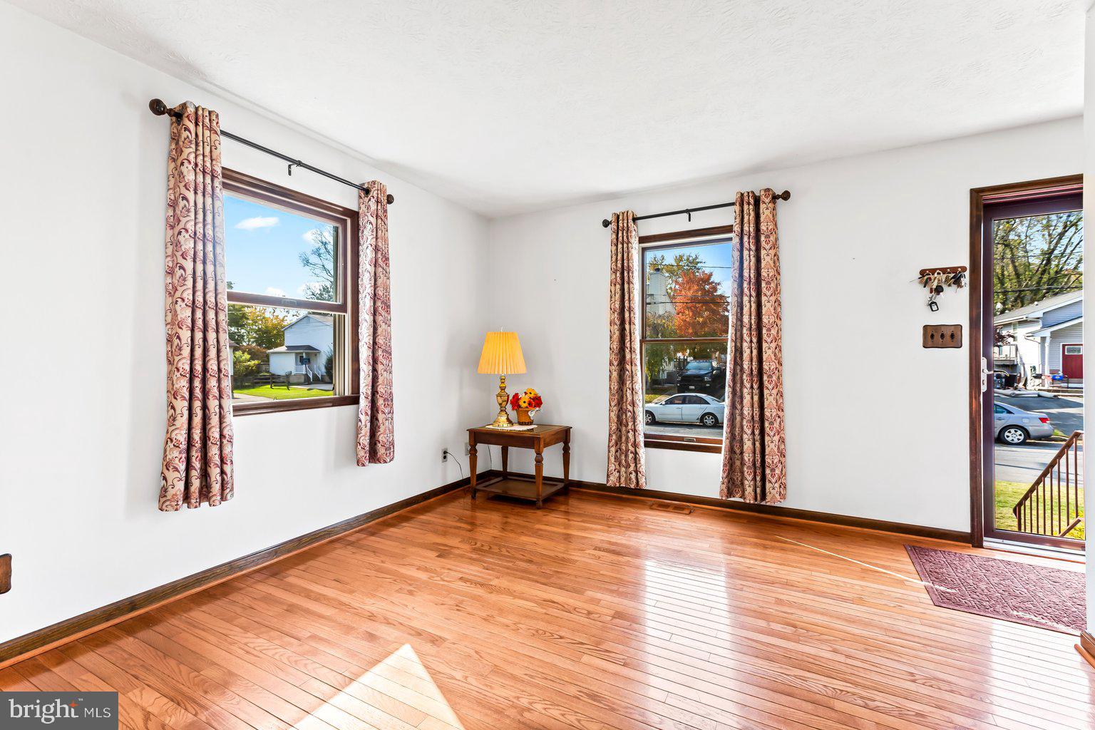 1222 Kendrick Road Rosedale, MD 21237 - Photo 5 of 40 Sun-drenched Living Room with hardwood floors