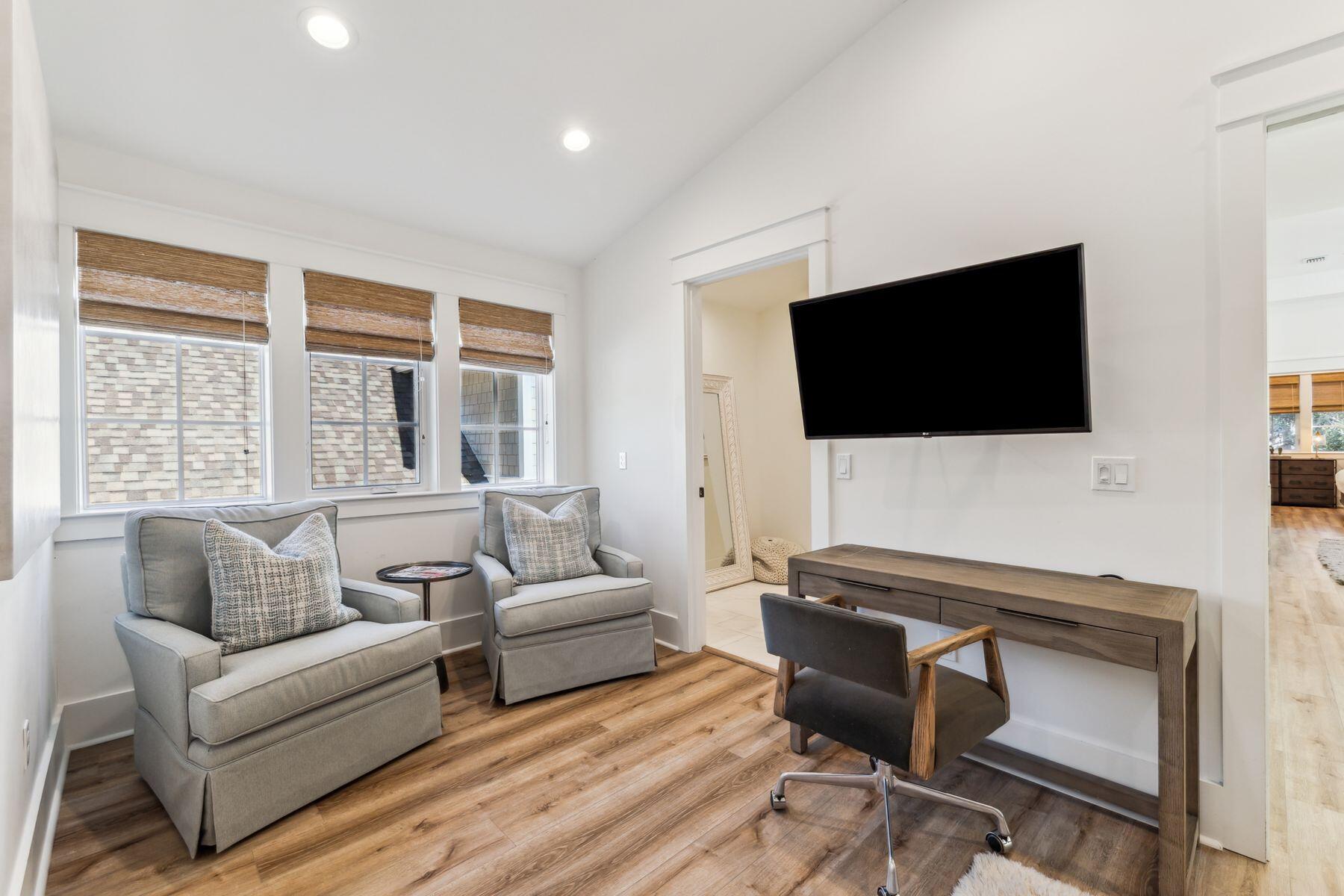 207 Anchor Rode Circle Santa Rosa Beach, FL 32459 - Photo 31 of 44 a living room with furniture and a flat screen tv