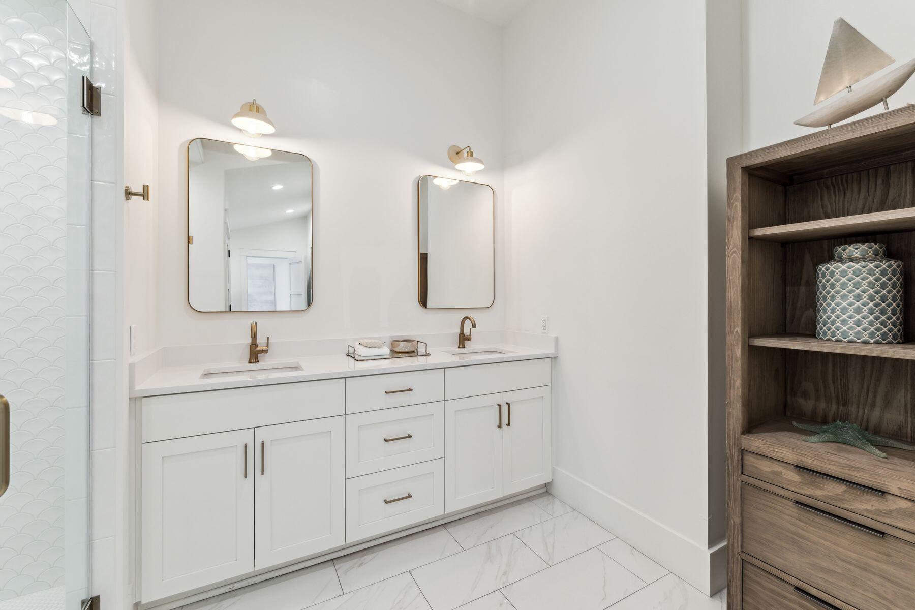 207 Anchor Rode Circle Santa Rosa Beach, FL 32459 - Photo 33 of 44 a bathroom with a double vanity sink and mirror
