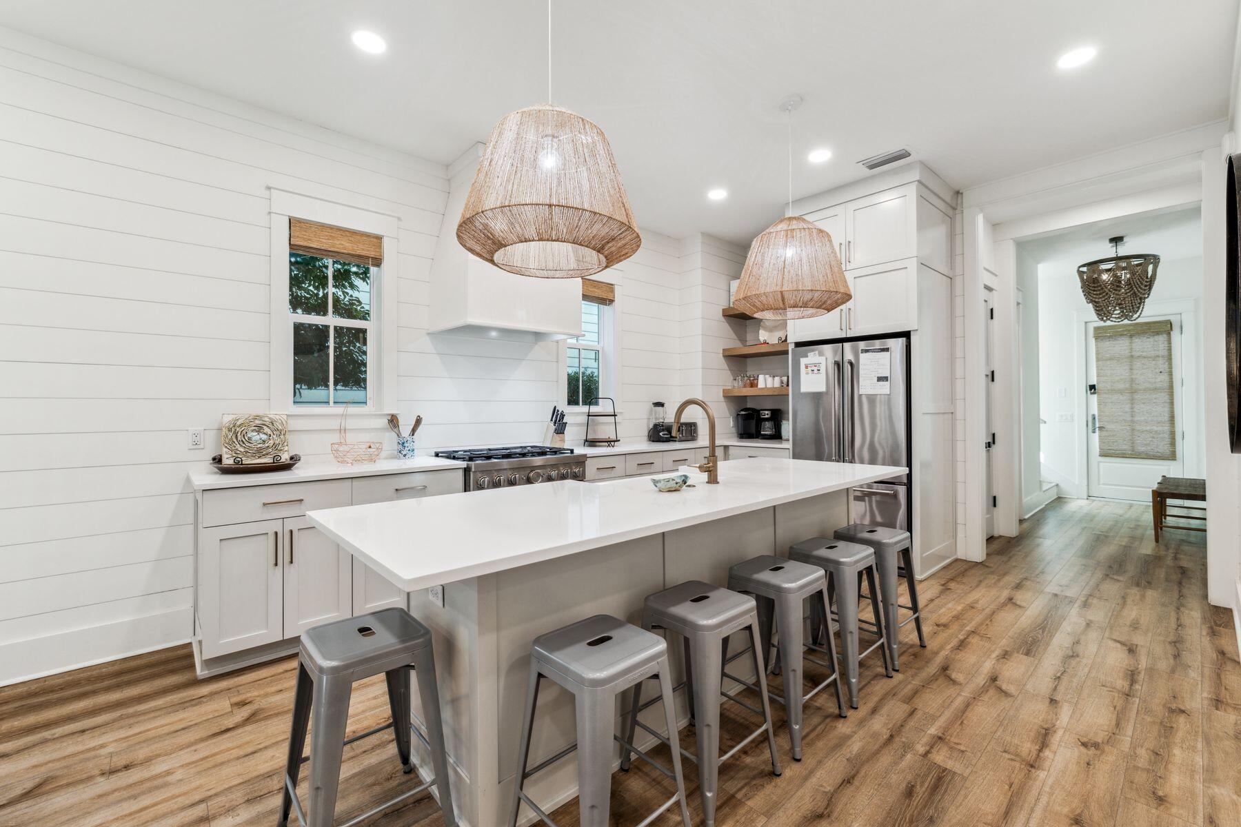 207 Anchor Rode Circle Santa Rosa Beach, FL 32459 - Photo 4 of 44 a large kitchen with a table and chairs
