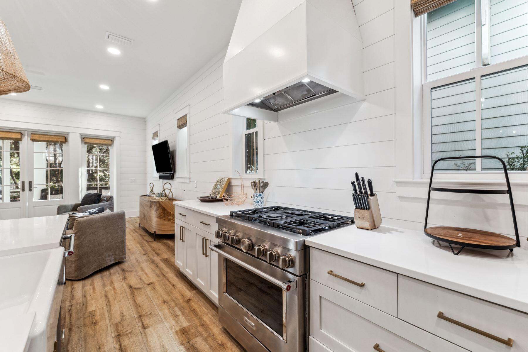 207 Anchor Rode Circle Santa Rosa Beach, FL 32459 - Photo 5 of 44 a kitchen with a stove and a sink