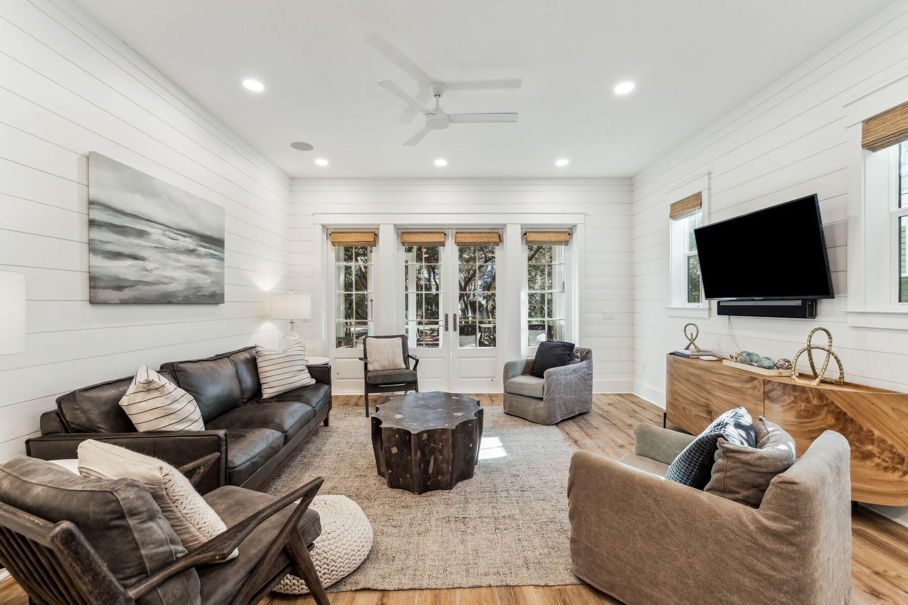 207 Anchor Rode Circle Santa Rosa Beach, FL 32459 - Photo 8 of 44 a living room with furniture and a flat screen tv