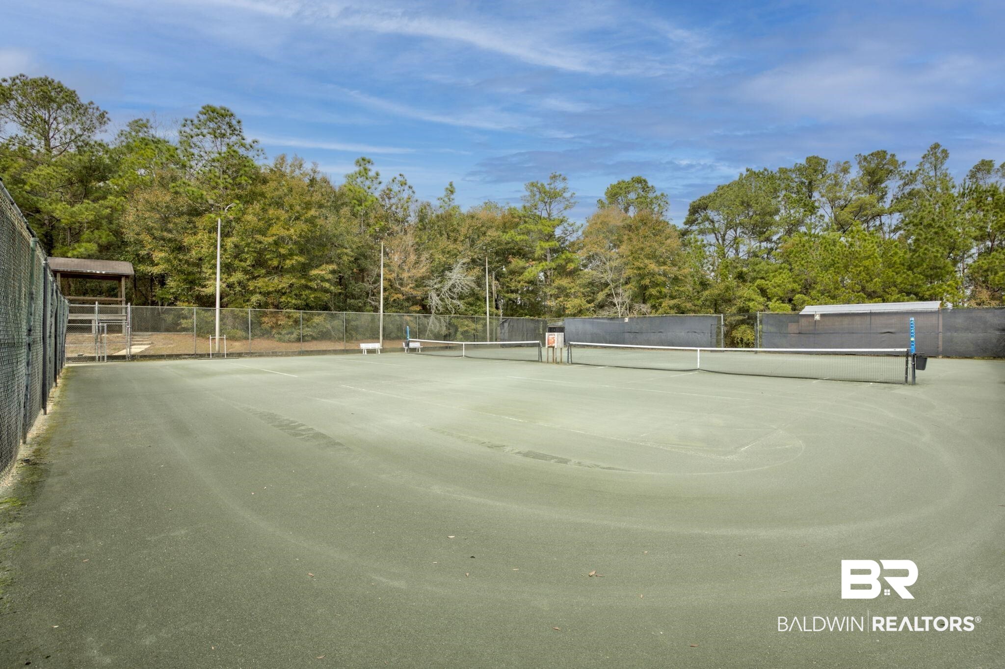 332 Ridgewood Drive Daphne, AL 36526 - Photo 45 of 48 View of tennis court featuring view of scattered trees