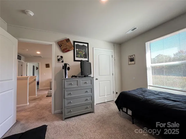 a view of a chairs and table in the patio