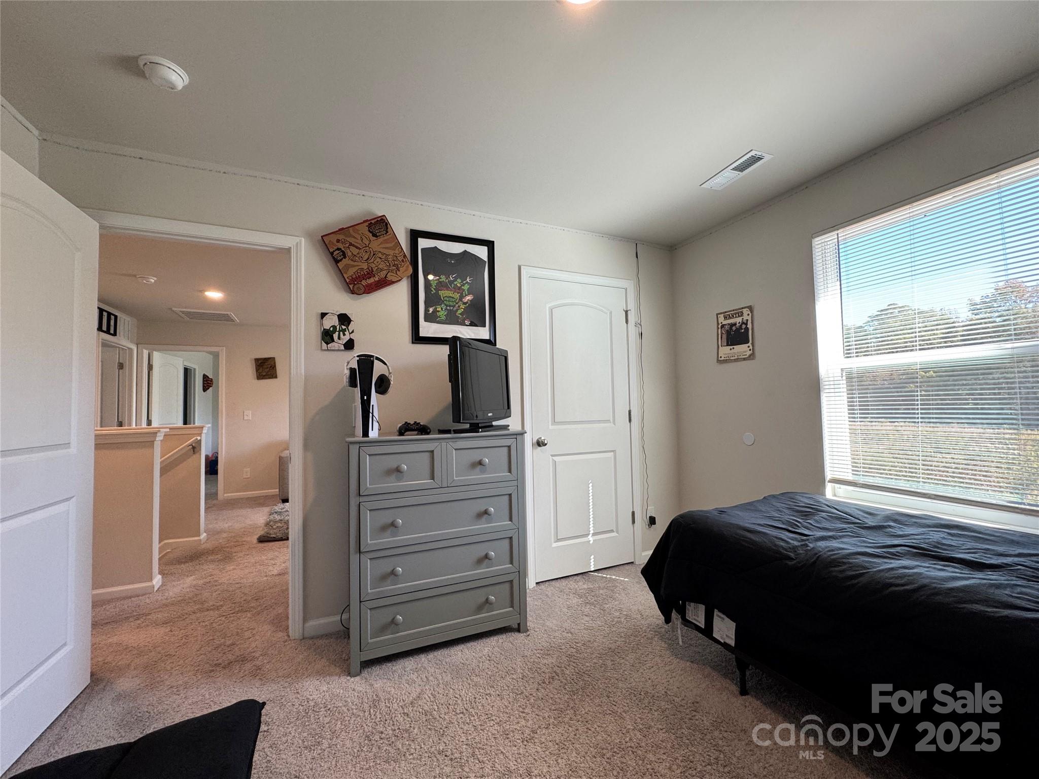 327 J C Dellinger Road Cherryville, NC 28021 - Photo 26 of 30 a bedroom with a bed and a dresser