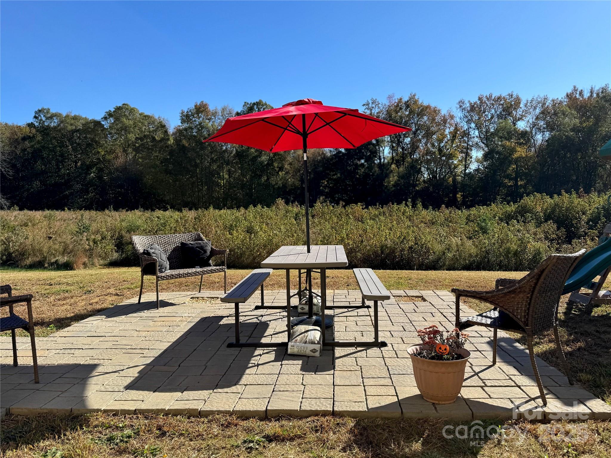 327 J C Dellinger Road Cherryville, NC 28021 - Photo 27 of 30 a view of a chairs and table in the patio