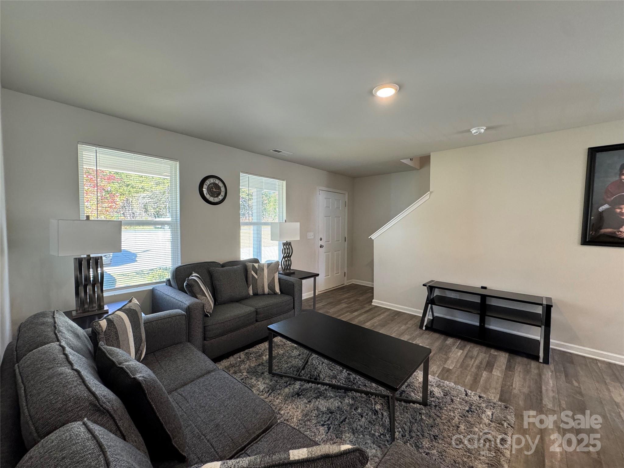 327 J C Dellinger Road Cherryville, NC 28021 - Photo 10 of 30 a living room with furniture and a wooden floor