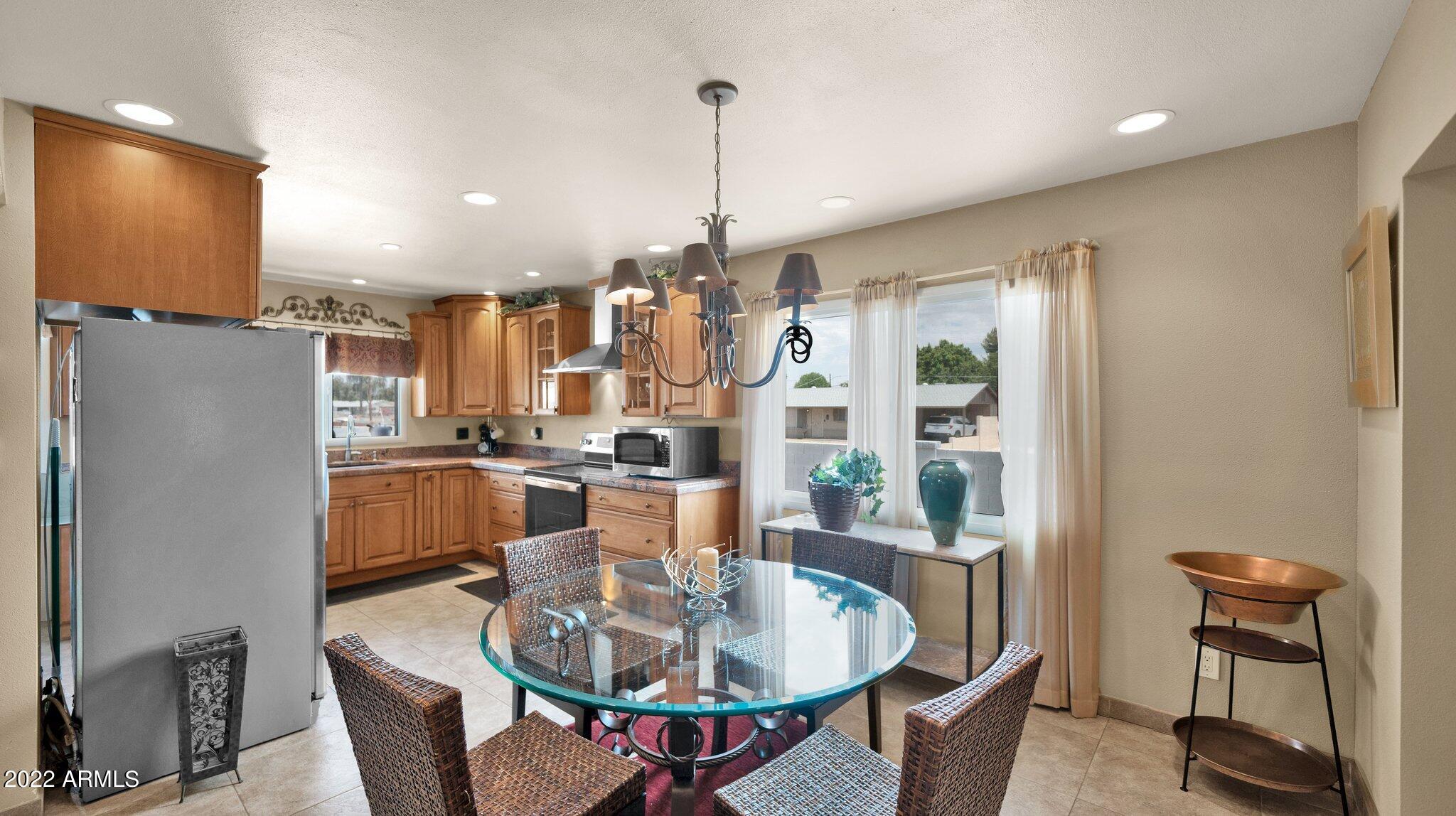 3902 West Rancho Drive Phoenix, AZ 85019 - Photo 8 of 24 Dining to Kitchen