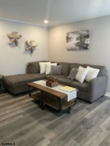 a living room with furniture and a couch