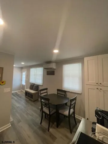 a view of a dining room with furniture