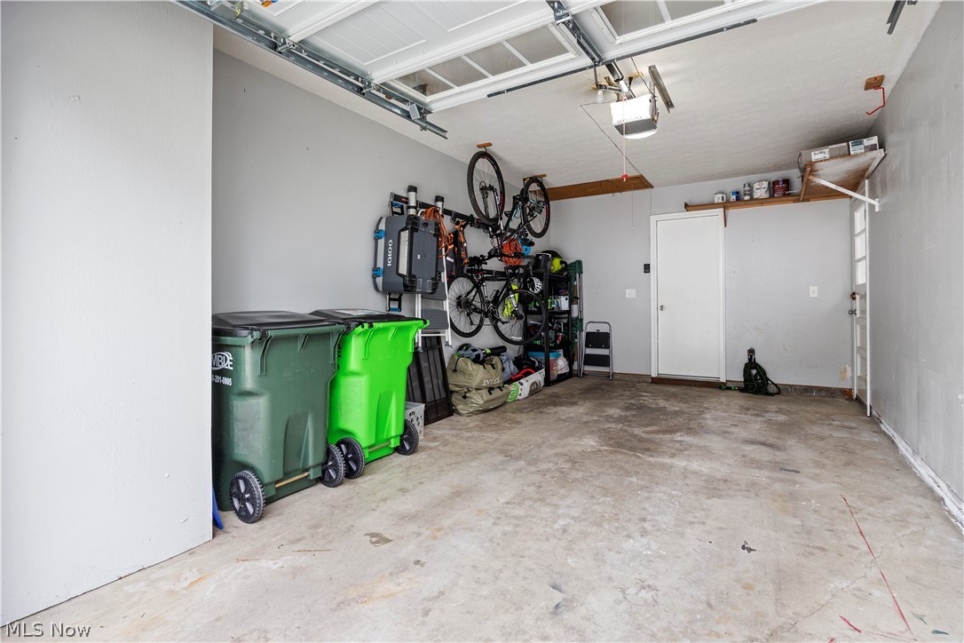 184 Sunset Road Avon Lake, OH 44012 - Photo 29 of 35 Garage featuring a garage door opener