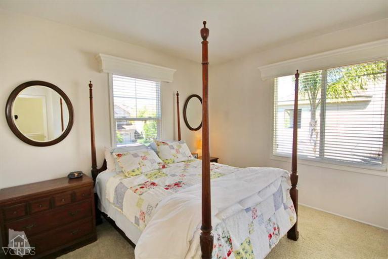 32 East Boulder Creek Road Simi Valley, CA 93065 - Photo 22 of 31 a bed sitting in a bedroom next to a window