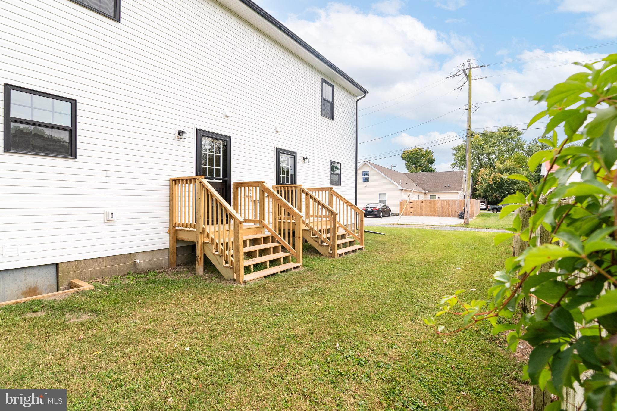 105 East Adams Street Georgetown, DE 19947 - Photo 6 of 49 a view of a house with backyard