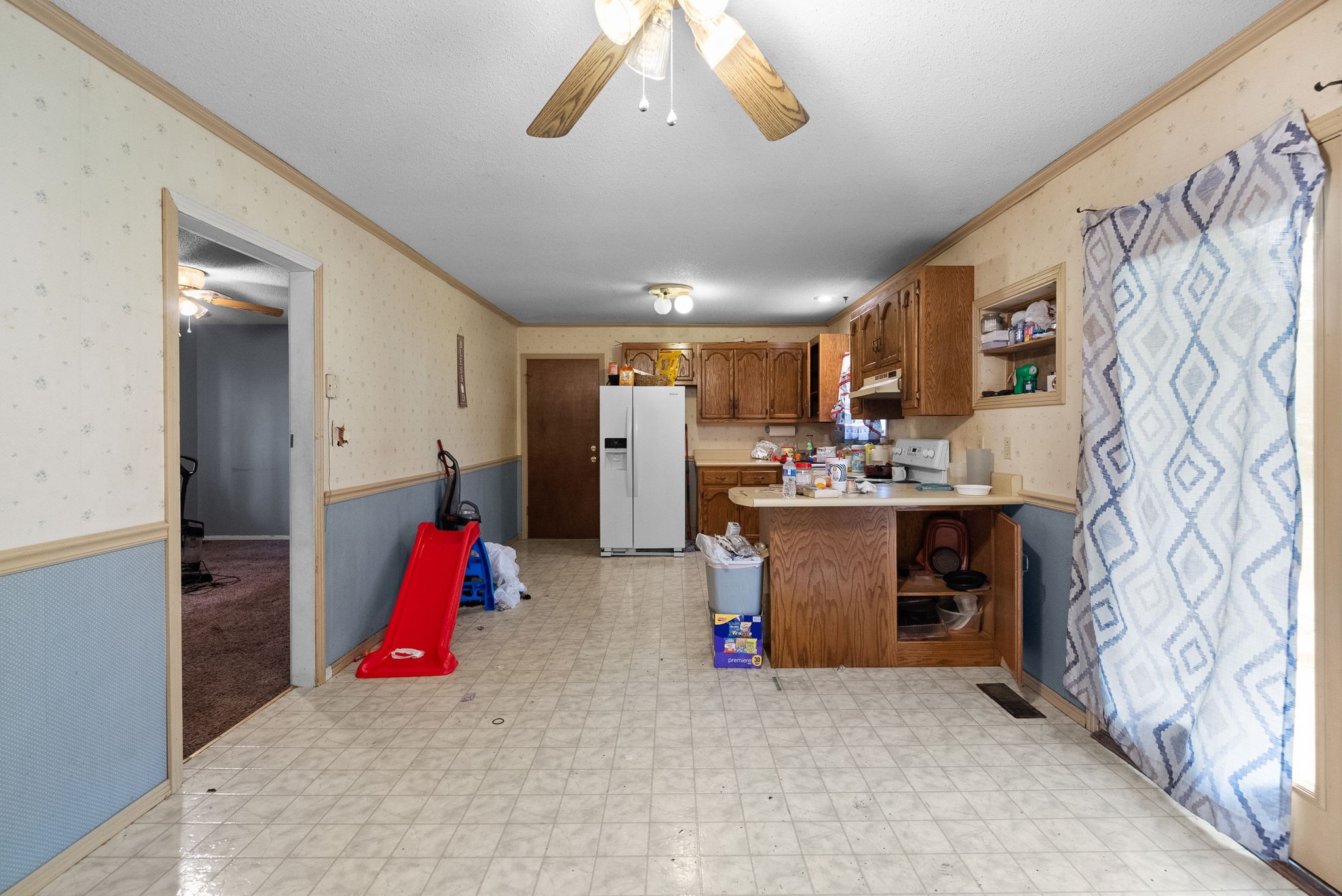 511 Ruby Drive Clarksville, TN 37040 - Photo 12 of 25 a view of kitchen with stainless steel appliances kitchen island microwave and cabinets