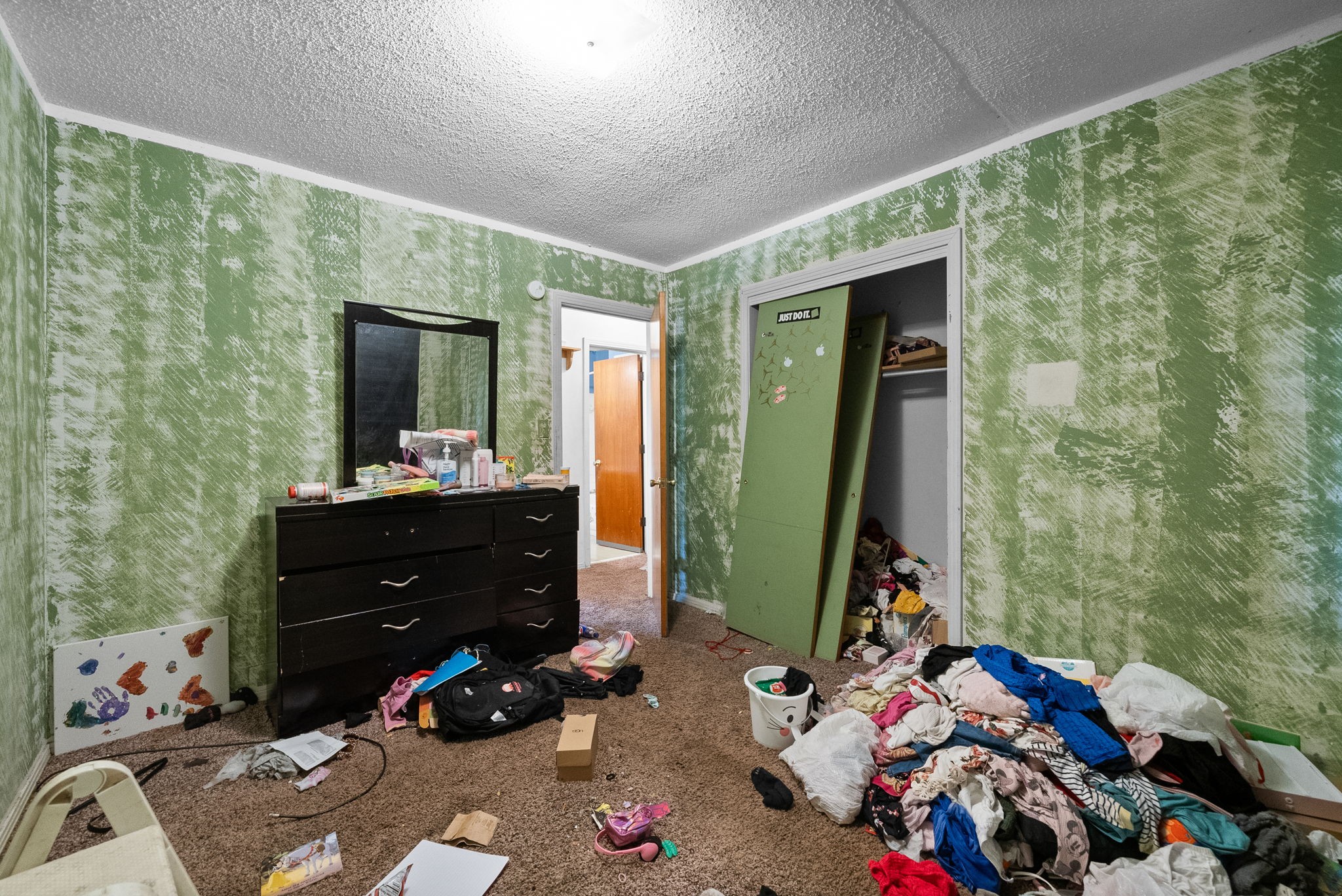 511 Ruby Drive Clarksville, TN 37040 - Photo 15 of 25 a bedroom with a bed and a mirror