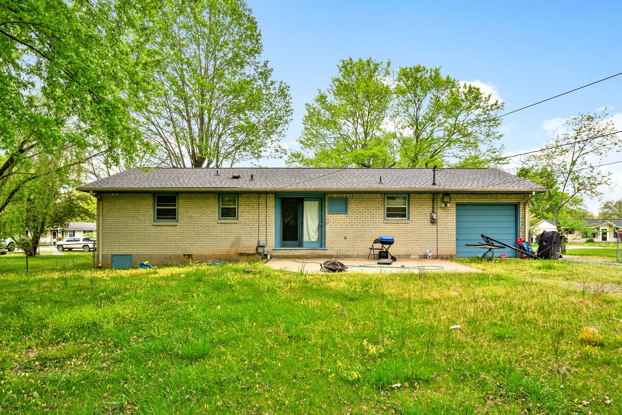 511 Ruby Drive Clarksville, TN 37040 - Photo 23 of 25 a front view of a house with a garden and trees