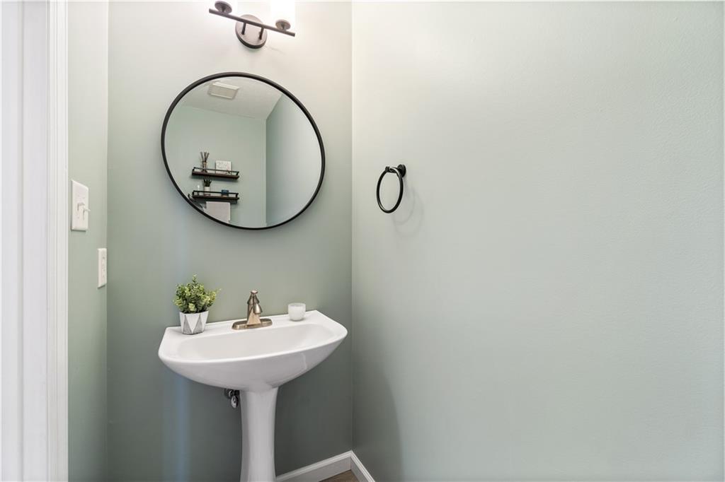 528 Pine Bluff Drive Mars, PA 16046 - Photo 13 of 25 a bathroom with a sink and a mirror