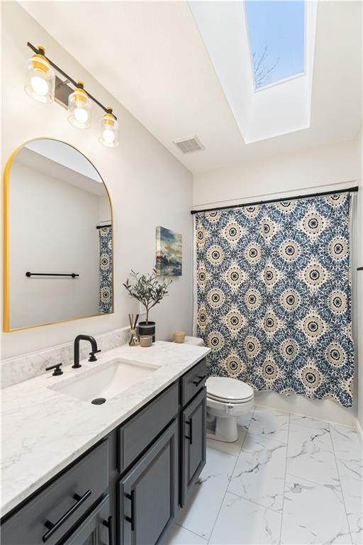 528 Pine Bluff Drive Mars, PA 16046 - Photo 18 of 25 a bathroom with a sink mirror vanity and toilet