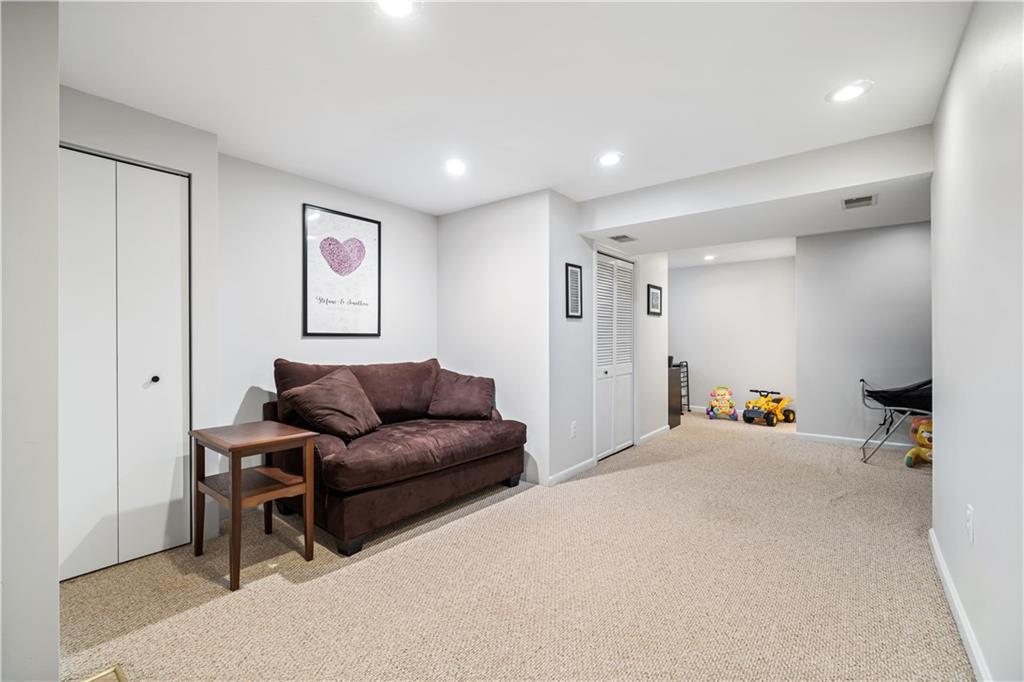 528 Pine Bluff Drive Mars, PA 16046 - Photo 21 of 25 a living room with furniture and a couch