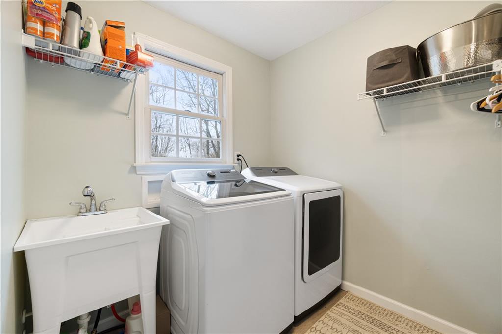 528 Pine Bluff Drive Mars, PA 16046 - Photo 22 of 25 a utility room with dryer and washer