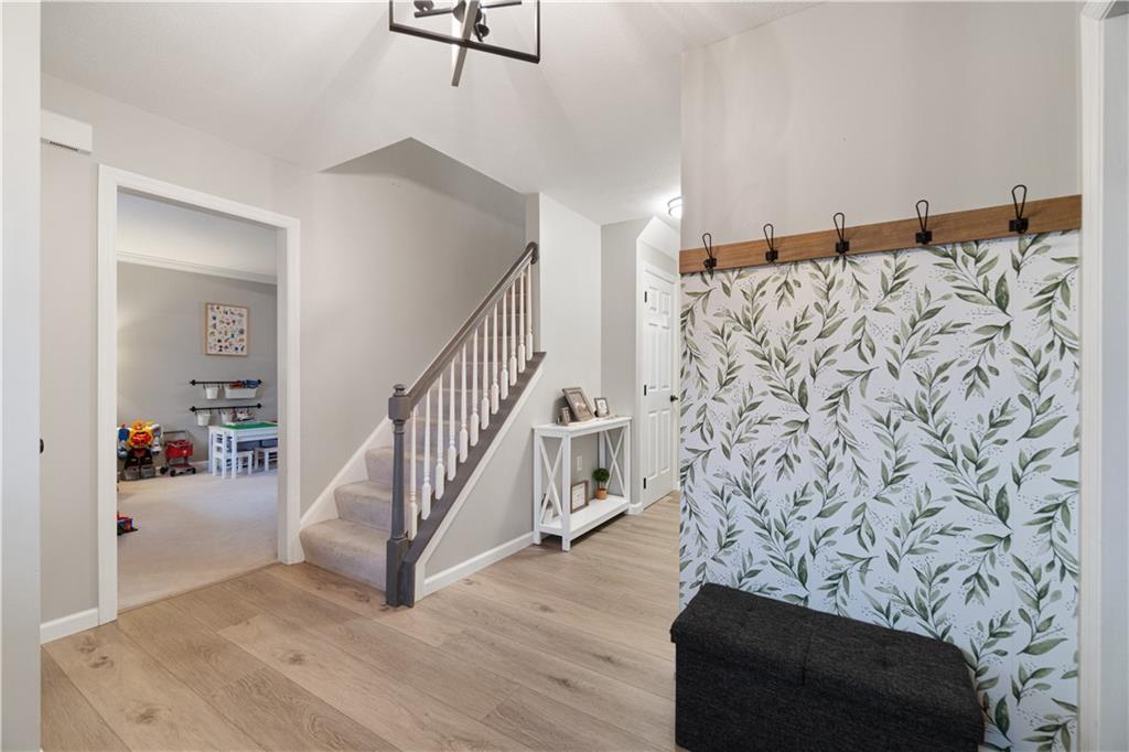 528 Pine Bluff Drive Mars, PA 16046 - Photo 3 of 25 a view of entryway with stairs and wooden floor