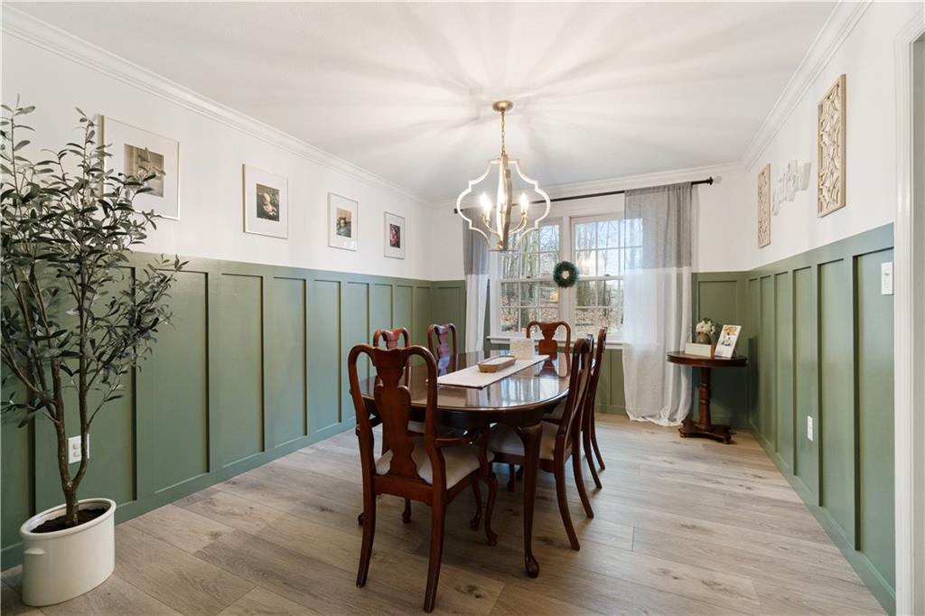 528 Pine Bluff Drive Mars, PA 16046 - Photo 4 of 25 a view of a dining room with furniture window and wooden floor