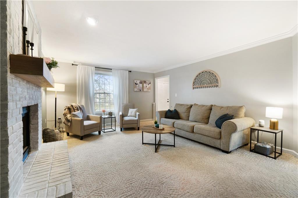 528 Pine Bluff Drive Mars, PA 16046 - Photo 7 of 25 a living room with furniture and a fireplace