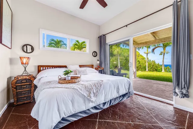 a living room with kitchen island furniture and a kitchen view
