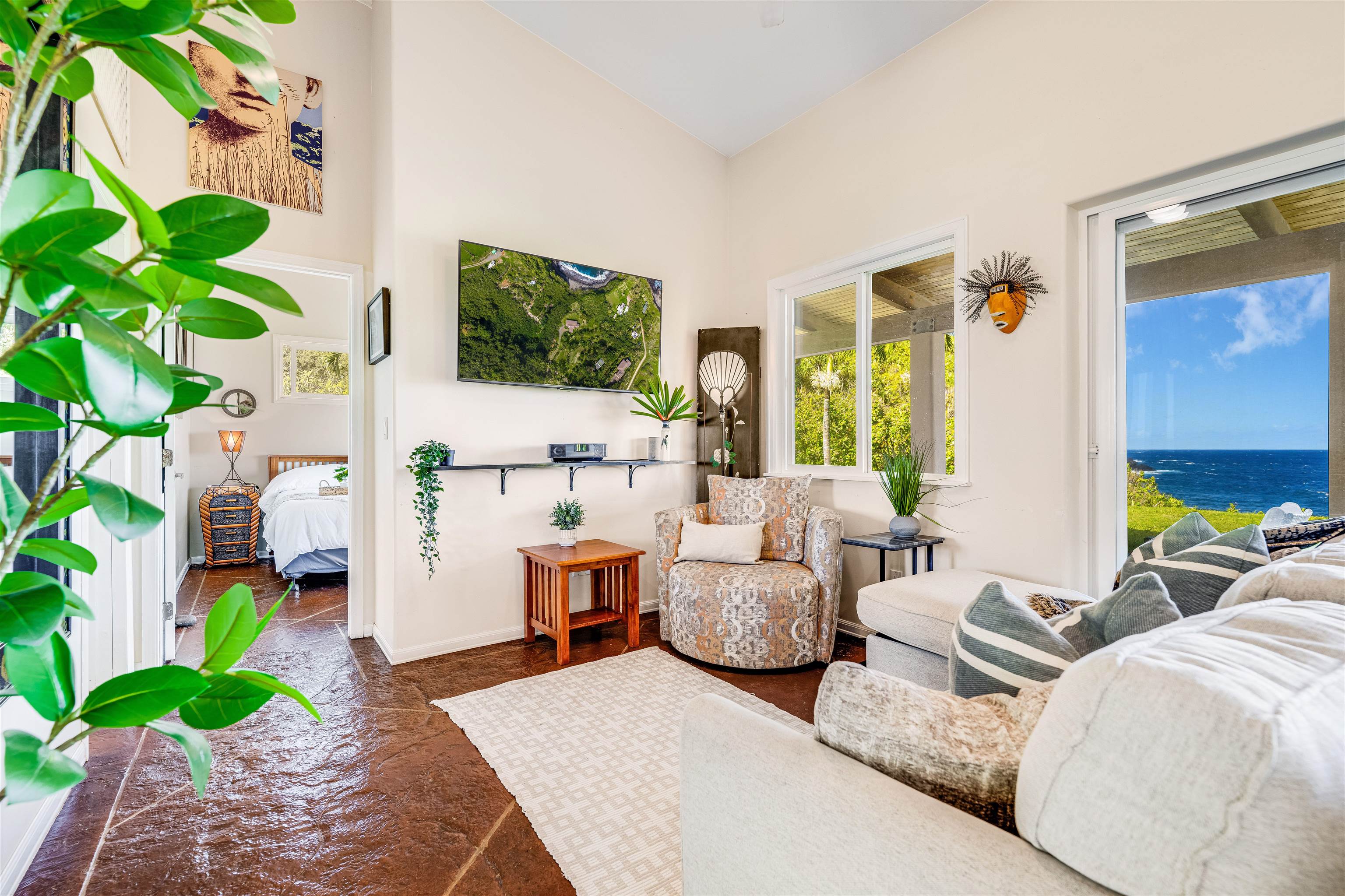 1004 North Honokala Road, Unit B Haiku, HI 96708 - Photo 12 of 48 a living room with furniture and a potted plant