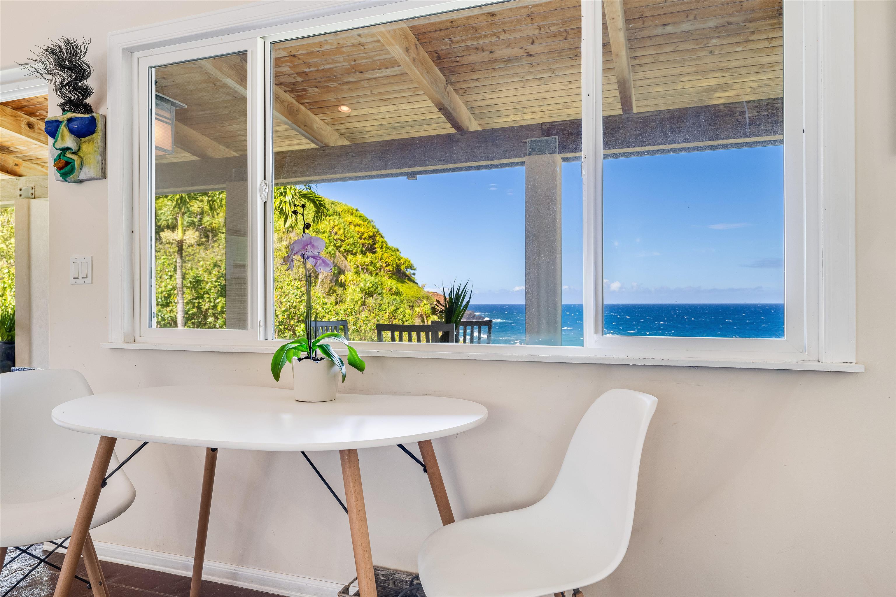1004 North Honokala Road, Unit B Haiku, HI 96708 - Photo 17 of 48 a dining room with furniture and window