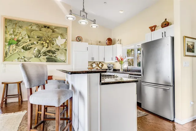 a vase of flowers sitting on a table