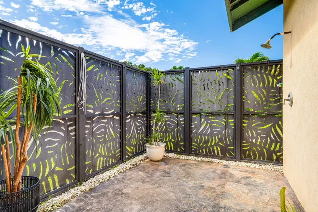 a bathroom with a granite countertop toilet a sink and bathtub