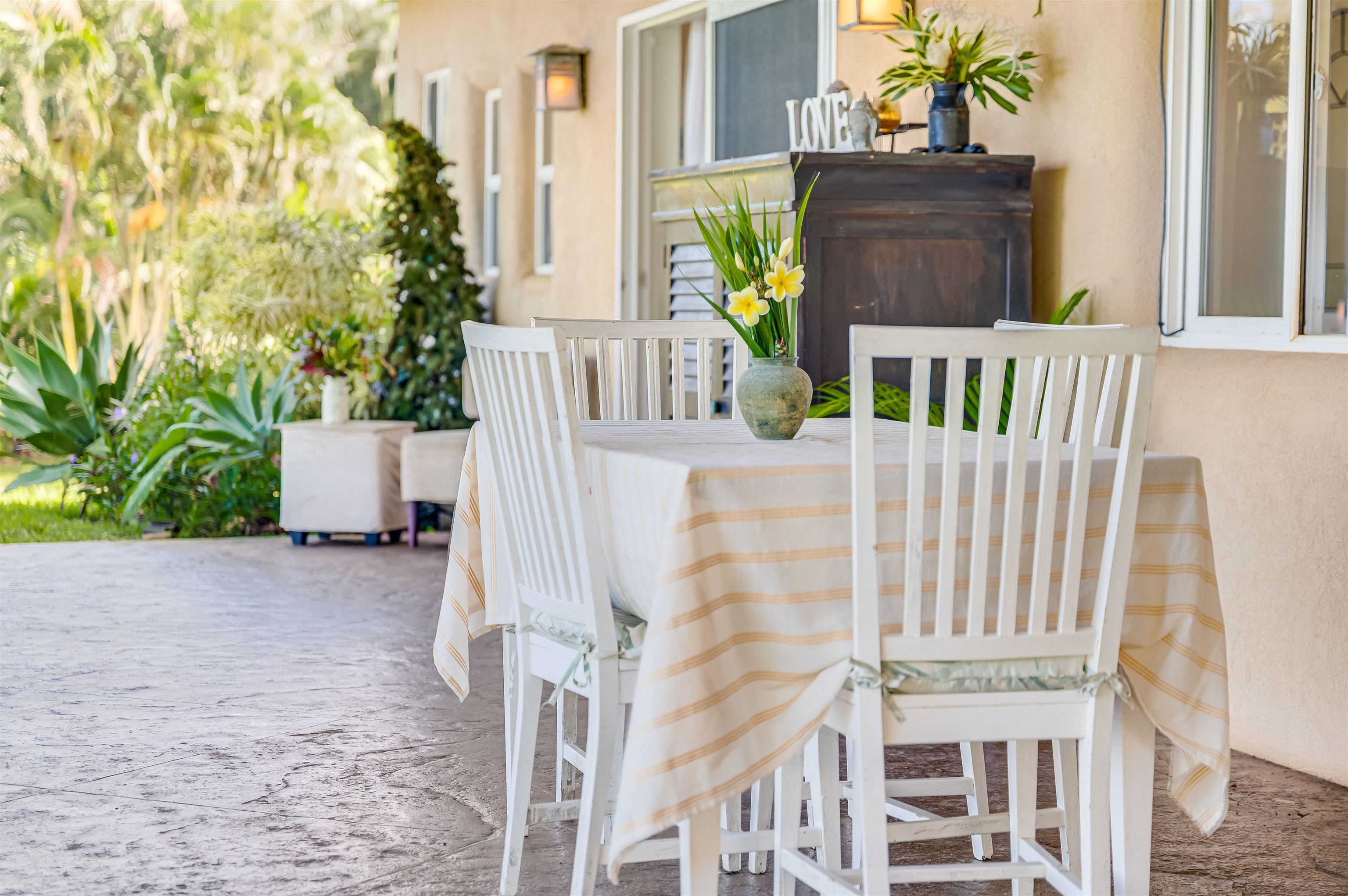 1004 North Honokala Road, Unit B Haiku, HI 96708 - Photo 35 of 49 a view of front door and potted plants