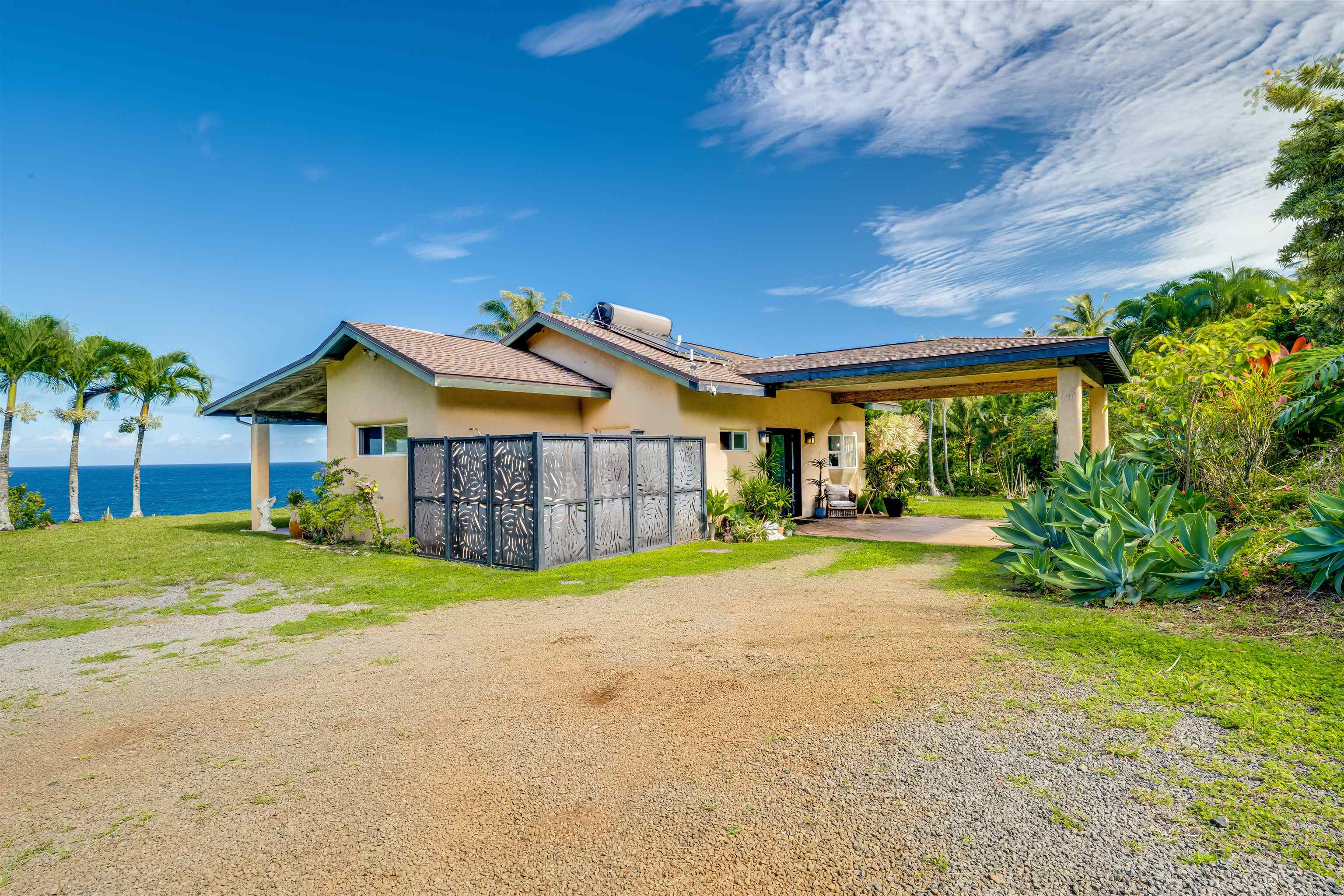 1004 North Honokala Road, Unit B Haiku, HI 96708 - Photo 38 of 48 a view of an house with backyard and patio