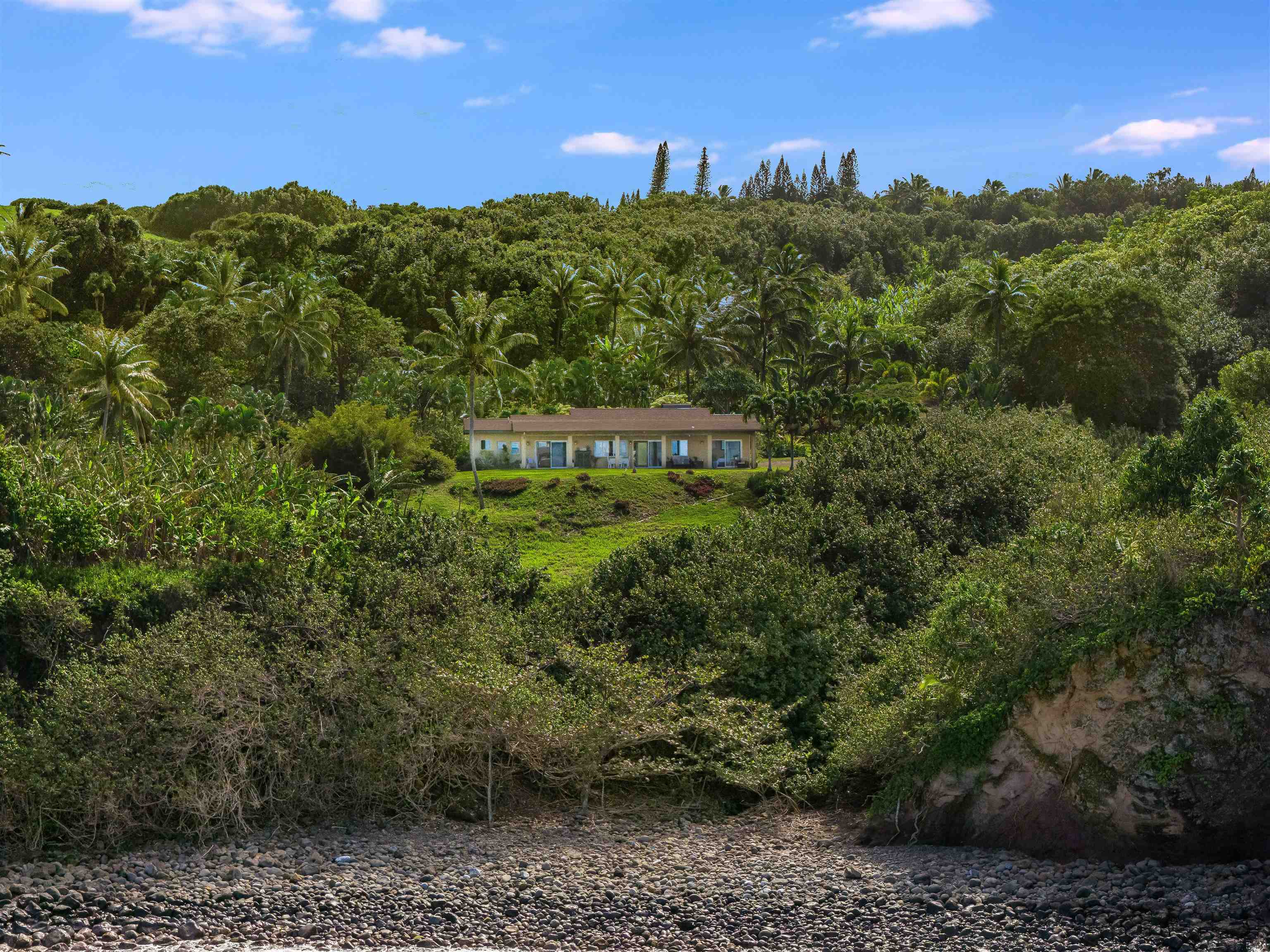 1004 North Honokala Road, Unit B Haiku, HI 96708 - Photo 42 of 49 a view of a city with sunset view