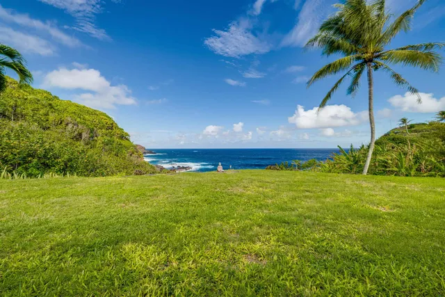 a bathroom with a tub and a shower