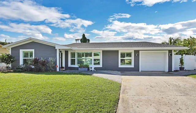 front view of a house with a patio