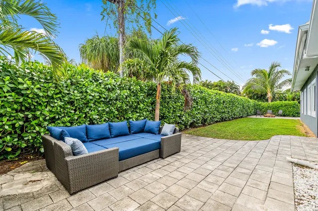 a view of a yard with furniture