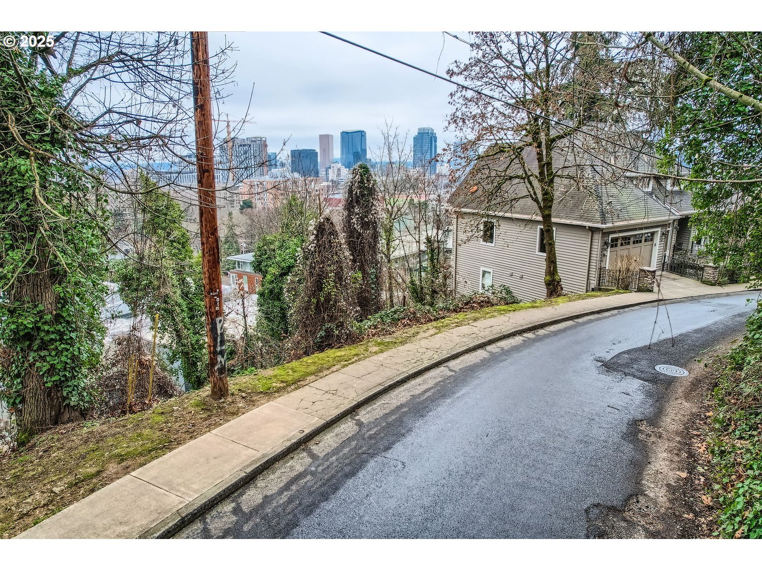 a view of a house with a street