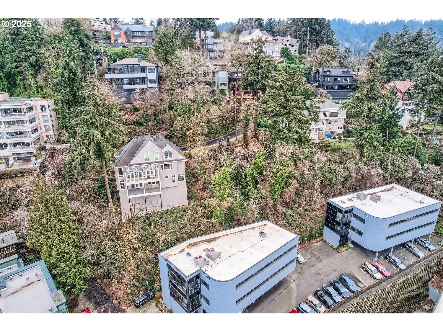2107 Southwest Market St Drive Portland, OR 97201 - Photo 5 of 13 an aerial view of a house with a garden