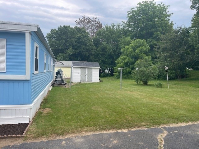 23 Riverview Circle Brimfield, MA 01010 - Photo 12 of 14 a view of a backyard with a garden