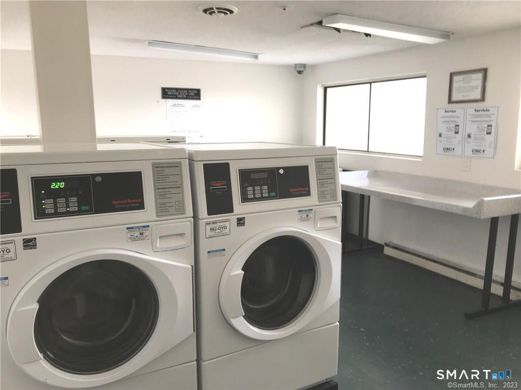 5 Nabby Road, Unit A17 Danbury, CT 06811 - Photo 10 of 11 a kitchen with a washer and dryer