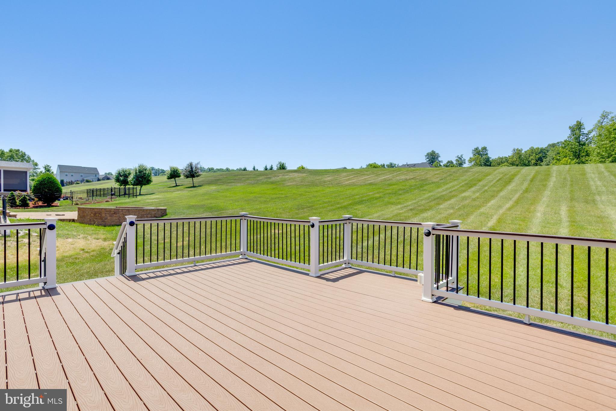 18475 Kerill Road Triangle, VA 22172 - Photo 16 of 99 a view of deck with a lake view