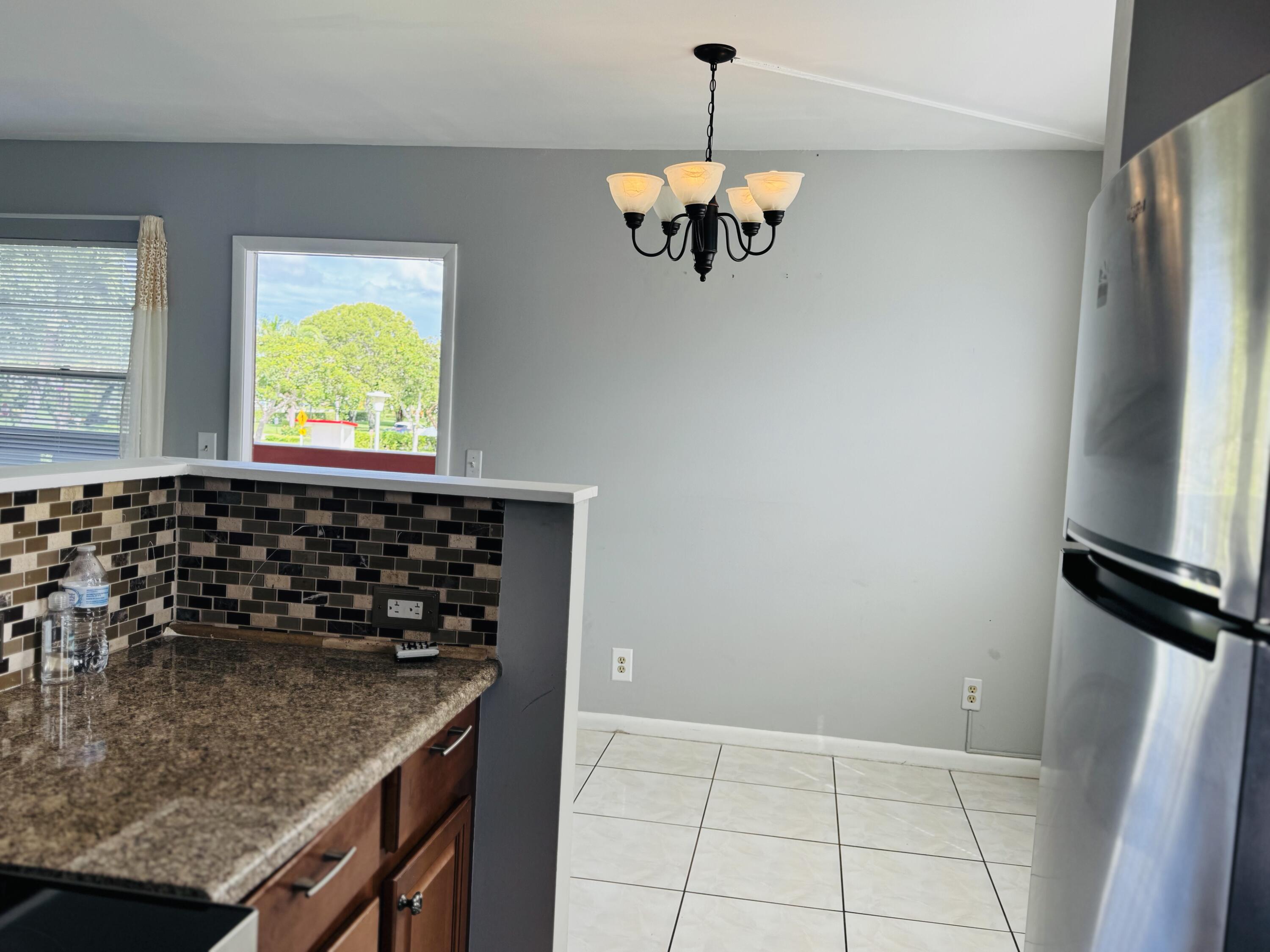 151 Brighton Drive, Unit D Boca Raton, FL 33434 - Photo 7 of 26 DINING ROOM