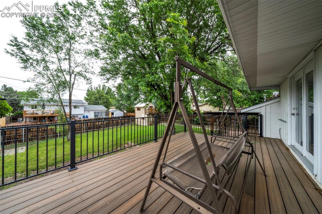 61 Louis Nelson Road Pueblo, CO 81001 - Photo 13 of 50 a view of house with backyard and deck
