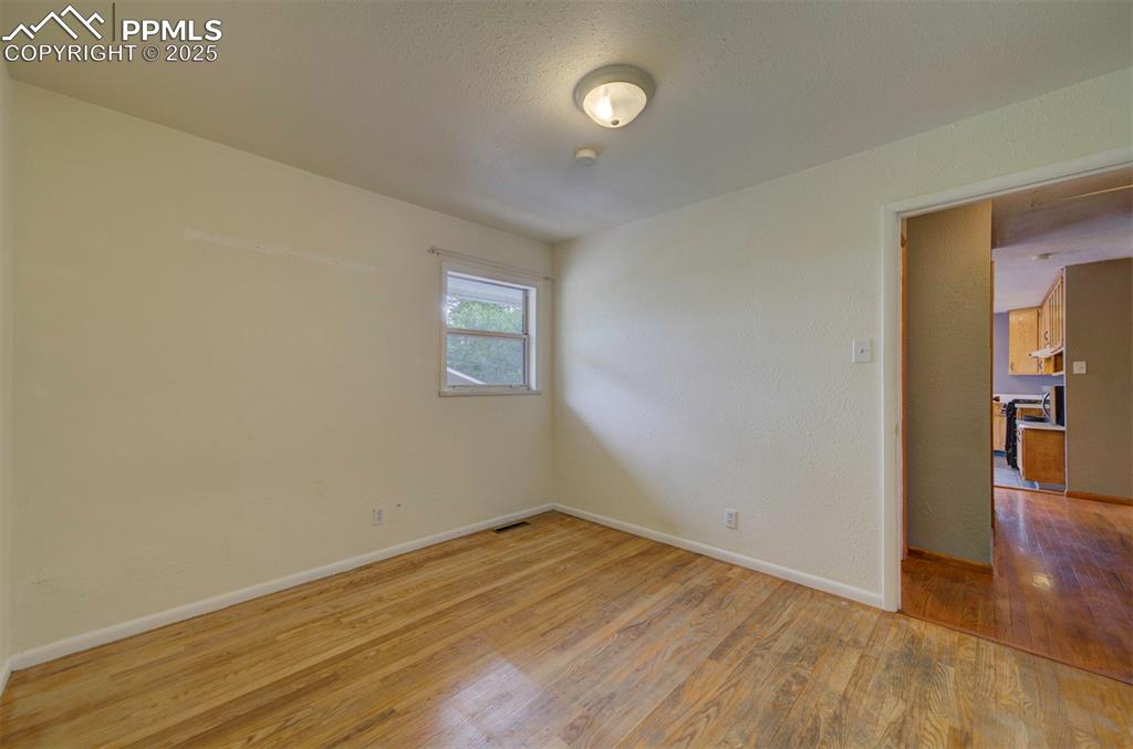 61 Louis Nelson Road Pueblo, CO 81001 - Photo 24 of 50 wooden floor in an empty room