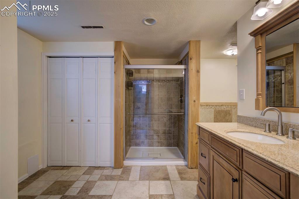 61 Louis Nelson Road Pueblo, CO 81001 - Photo 38 of 50 a bathroom with a sink and a shower