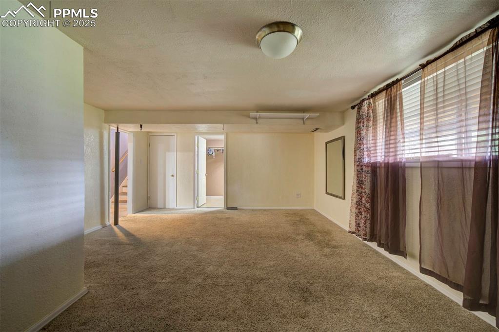 61 Louis Nelson Road Pueblo, CO 81001 - Photo 44 of 50 a view of a livingroom with a staircase